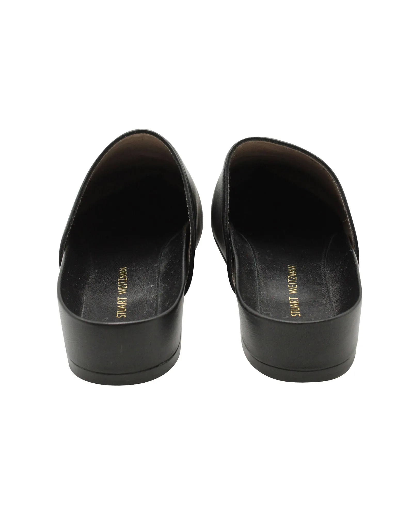 Stuart Weitzman Flat Mules in Black Leather